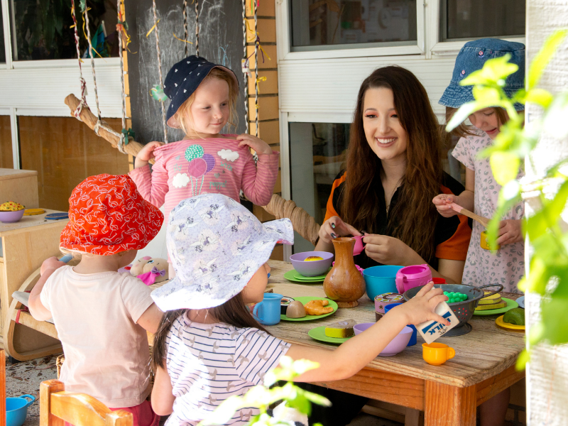 Communities@Work Greenway Child Care and Education Centre Educator with Children Tea Party