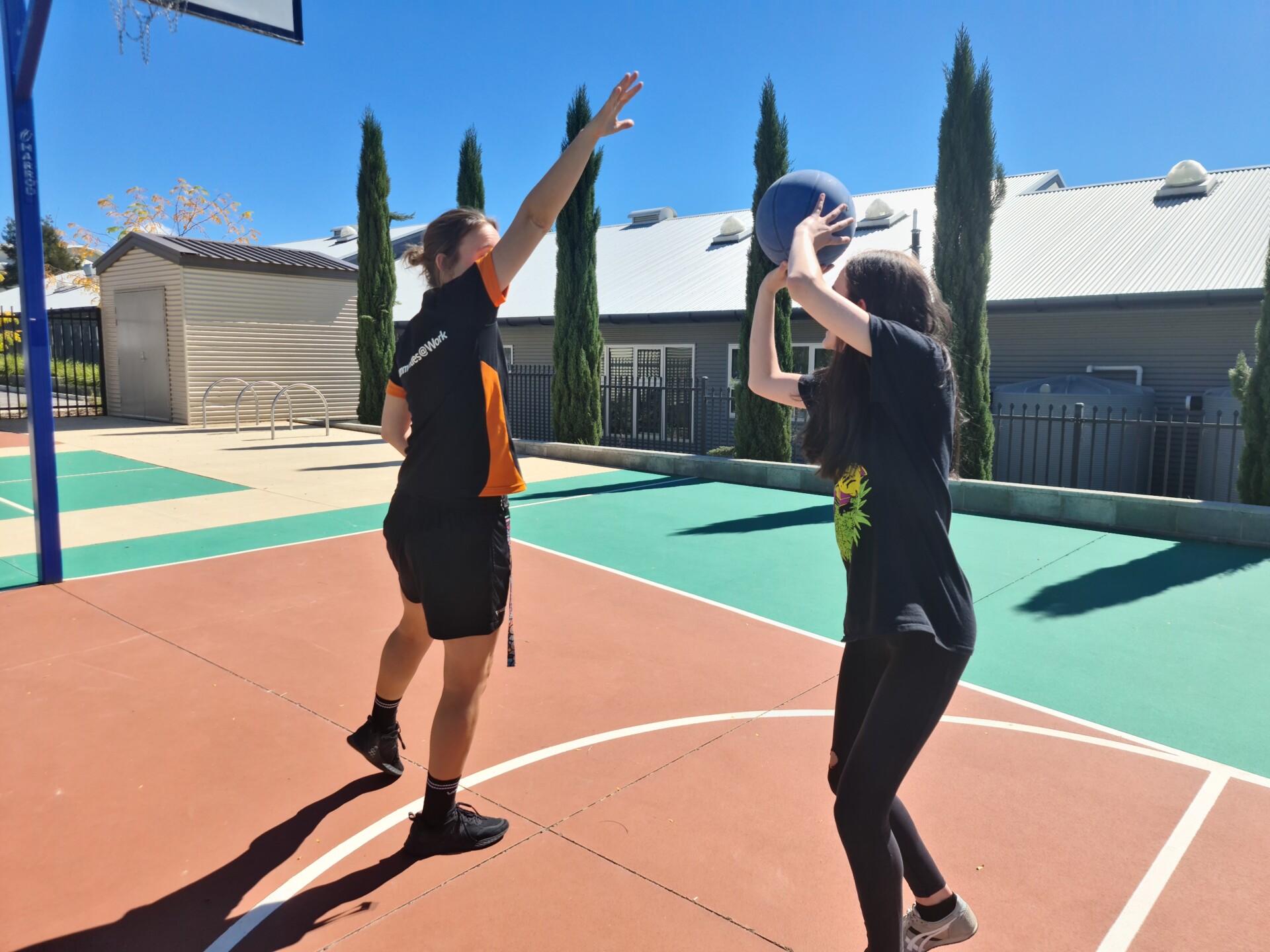 Playing basketball at Galilee School