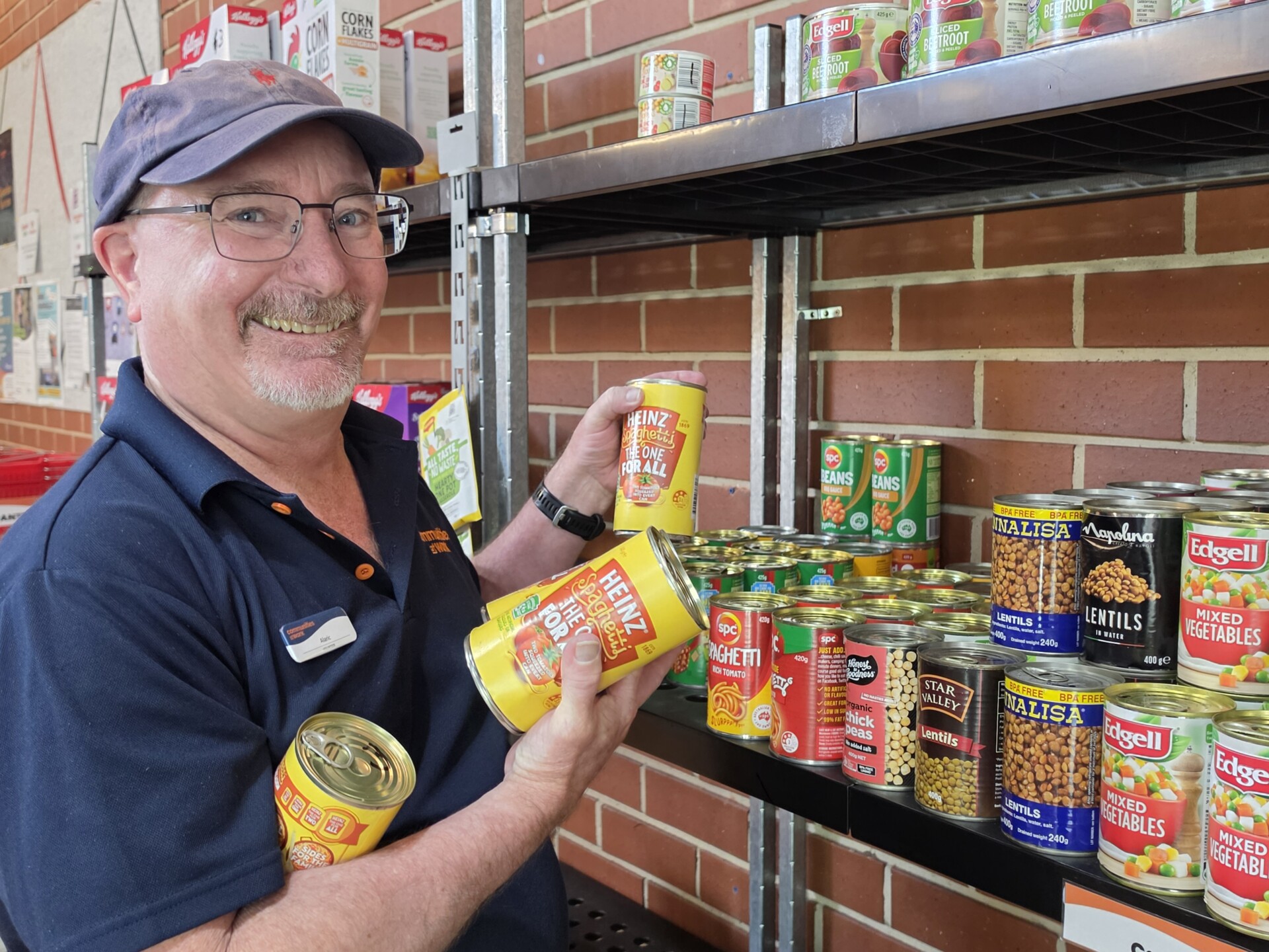 Volunteer_TCC pantry_local_charity_canberra_communities_at_work_donate_food